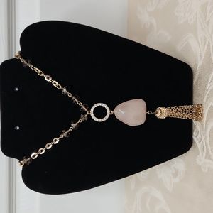 Necklace with pink stone and tassel long gold tone chain statement piece